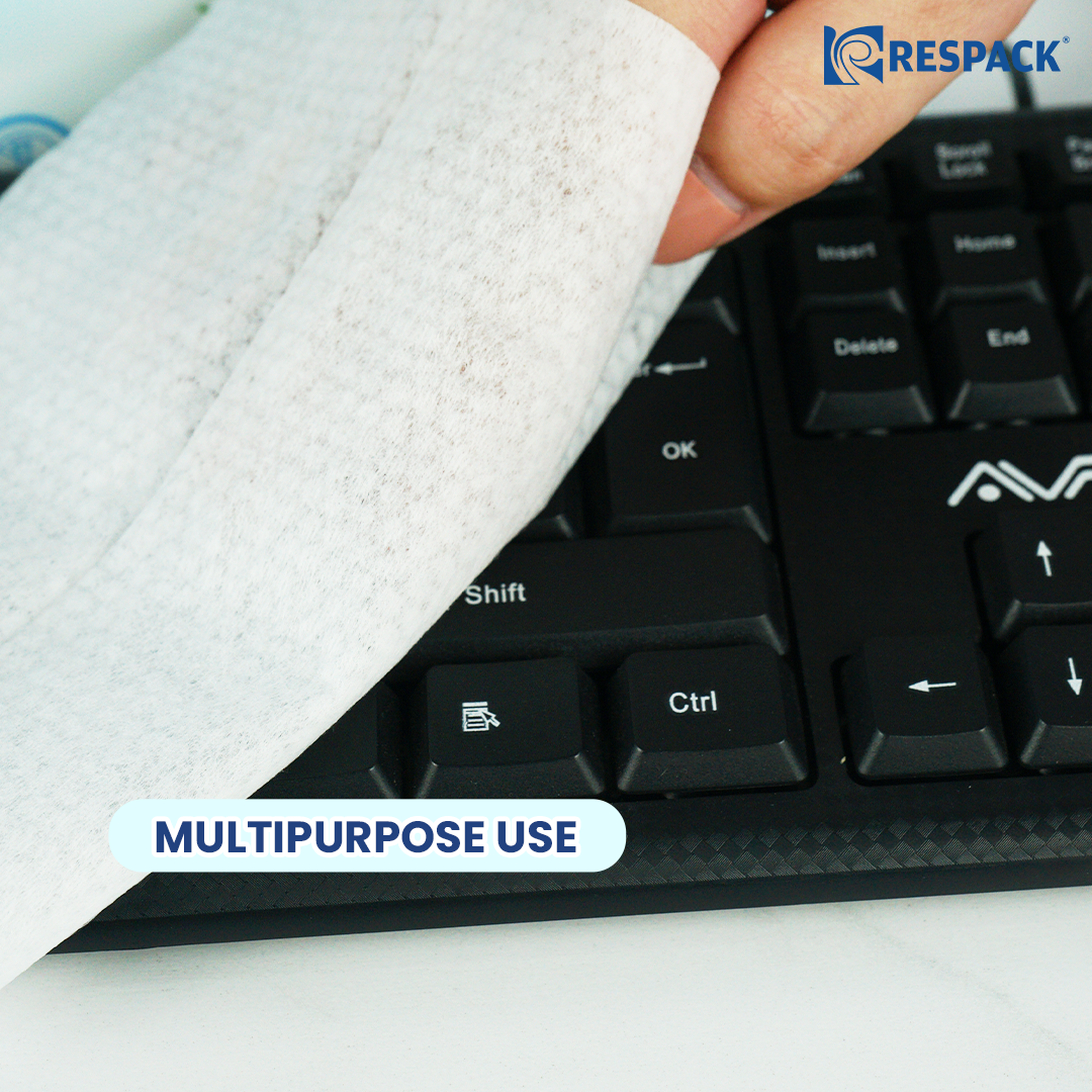 Wiping the keyboard with SOFCARE antibacterial wipes