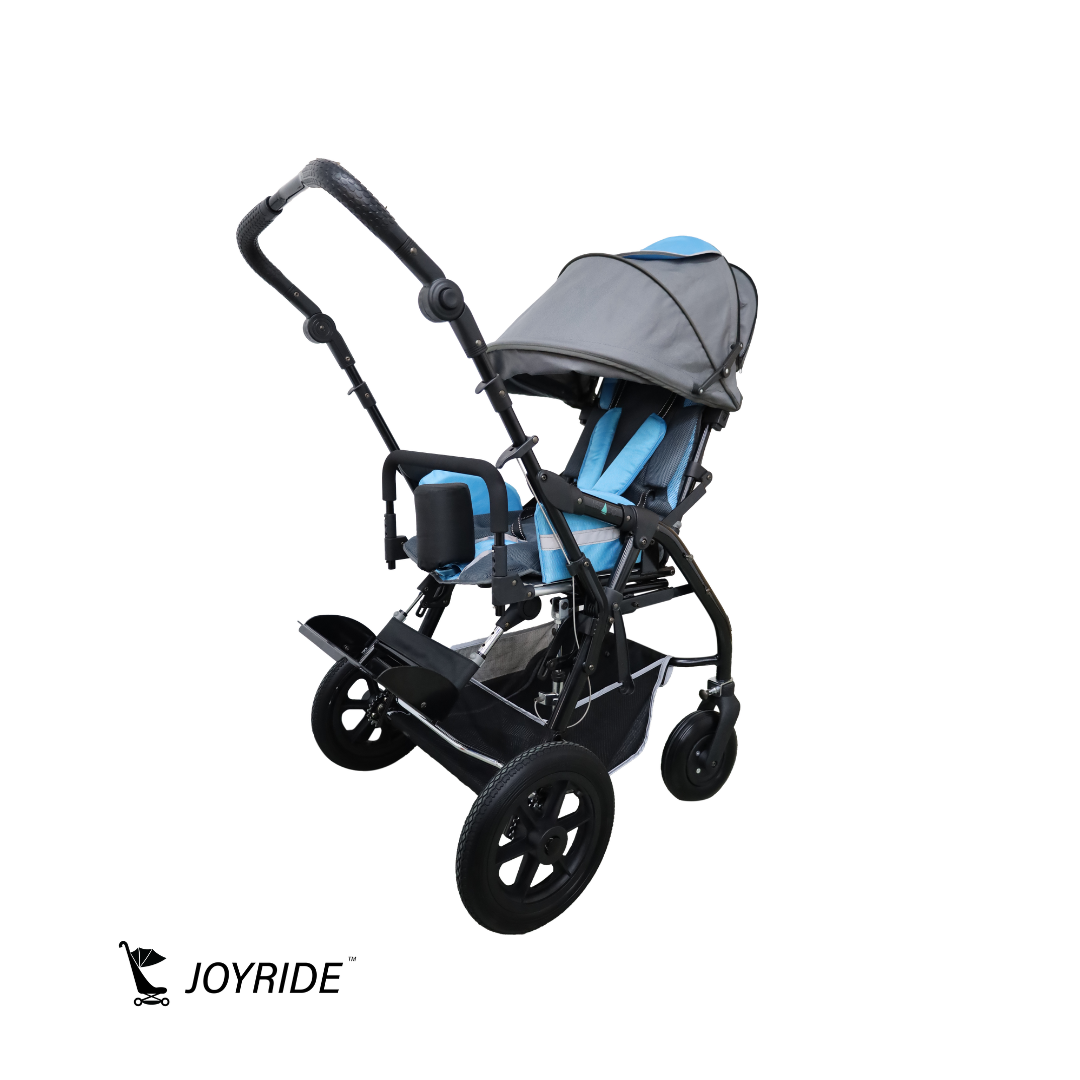 Angled side view of the Joyride Pediatric Blue Buggy highlighting the adjustable handle system, supportive blue pediatric seat, sun canopy, and all-terrain wheel design.