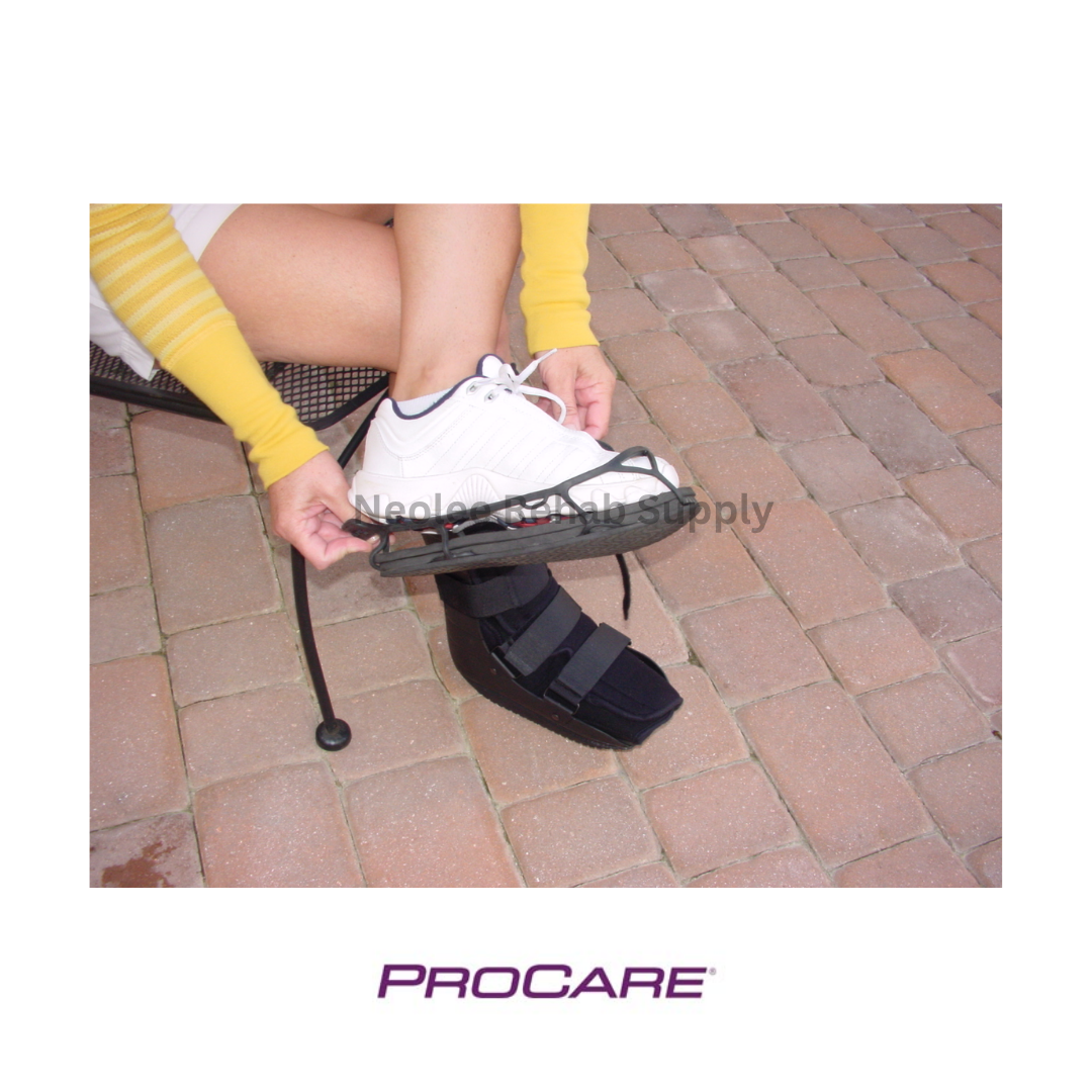 Procare Shoe Lift Balancer attached over a sneaker to equalize leg height while wearing a medical walking boot.