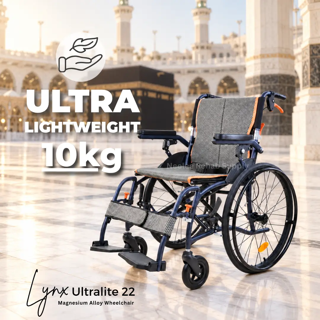 Lynx UltraLite 22 lightweight magnesium wheelchair displayed in Makkah featuring Masjid al-Haram and the Kaaba