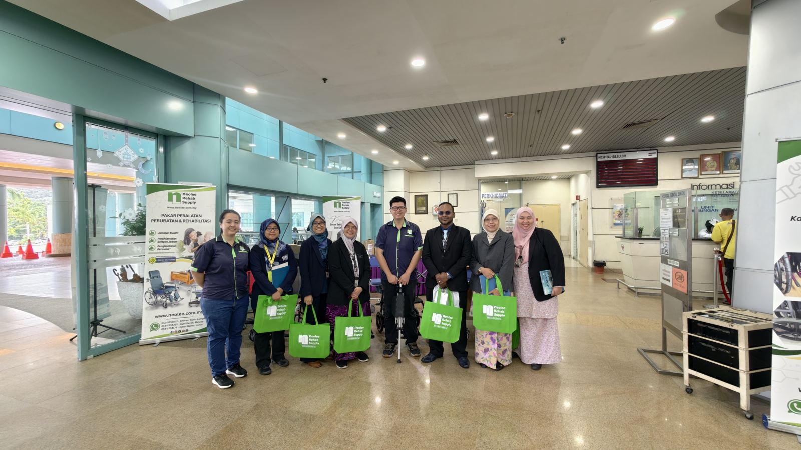 Neolee representatives and visitors at the Hospital Sungai Buloh equipment display